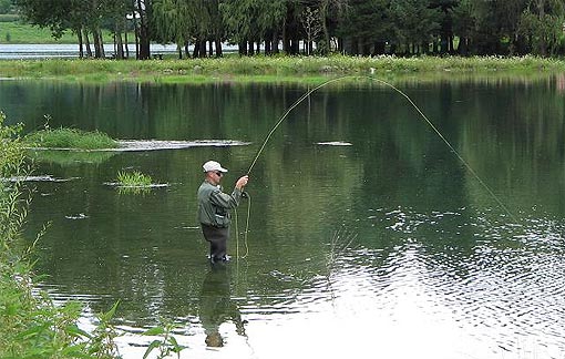 Ribič na jezeru Sabljaci